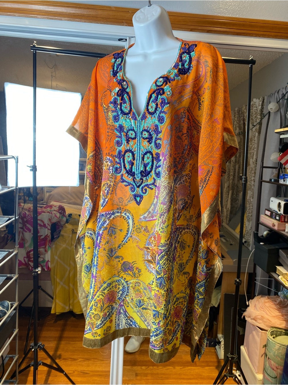 Orange and blue beaded tunic. Free matching bracelet included.